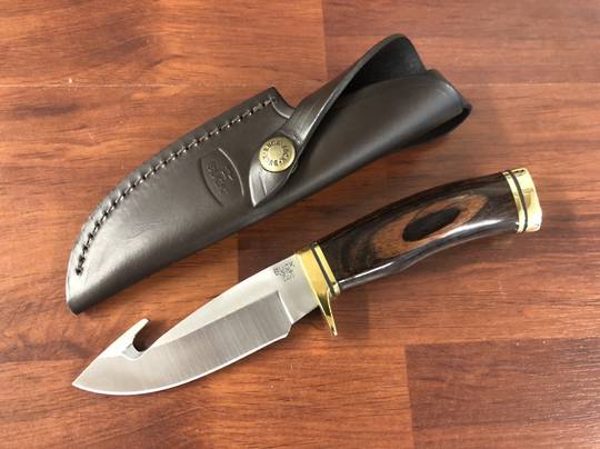 Buck Zipper Hunting Knife Fixed 4-1/4″ Blade with Gut Hook, Walnut